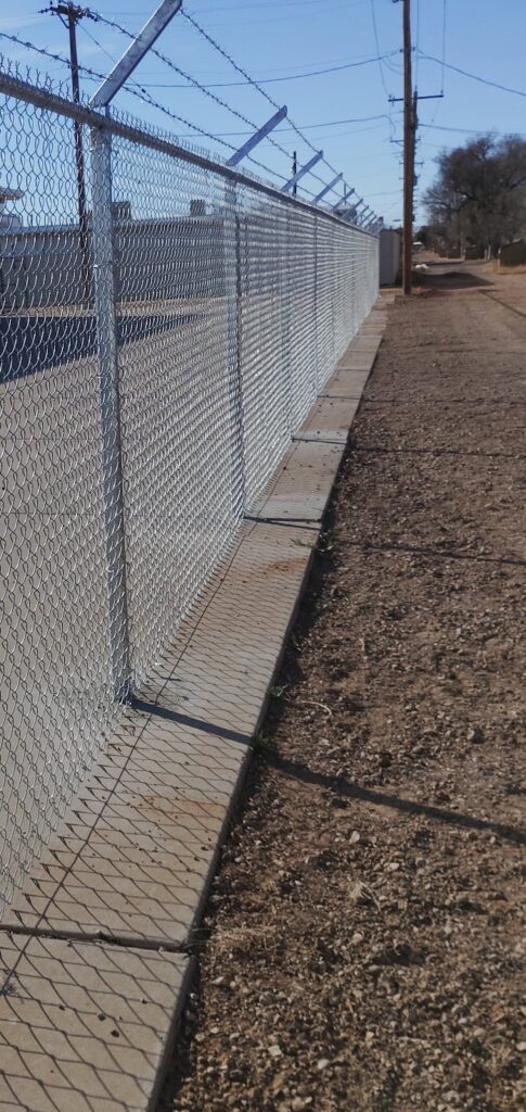 side commercial barbed fence